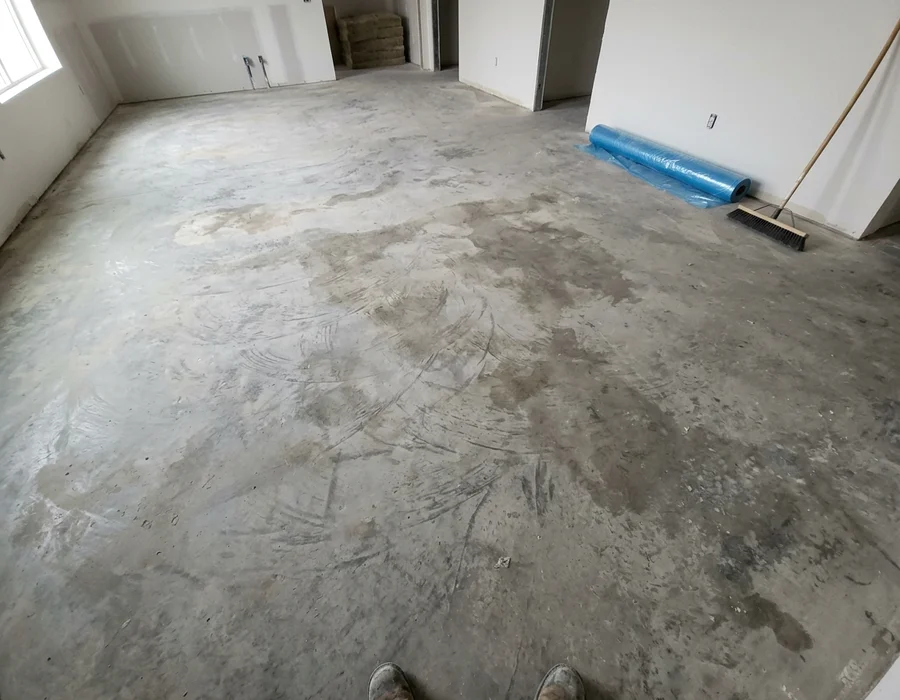 Dull, scuffed concrete slab before polishing